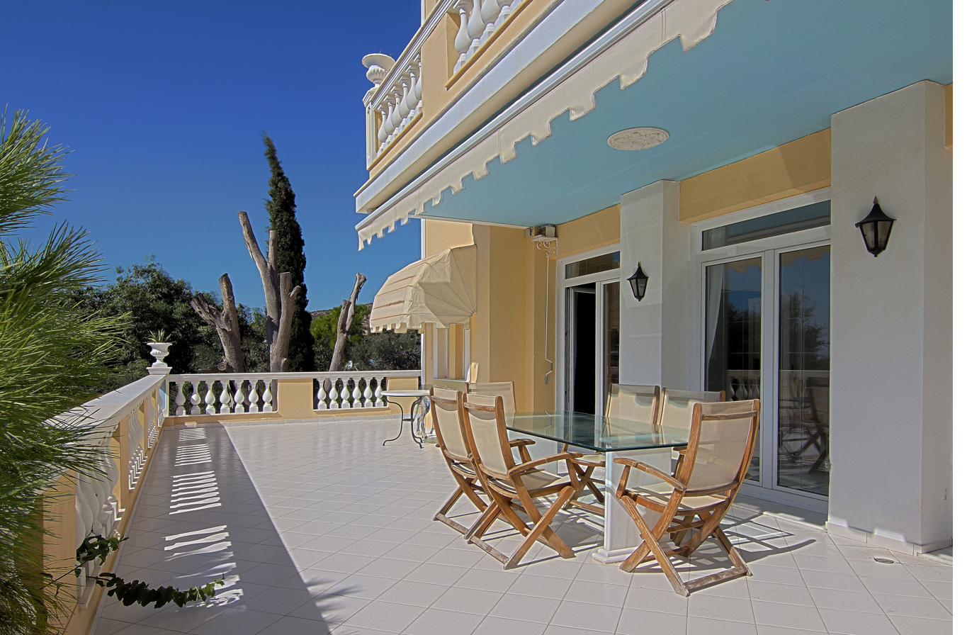 Main balcony with table and chairs