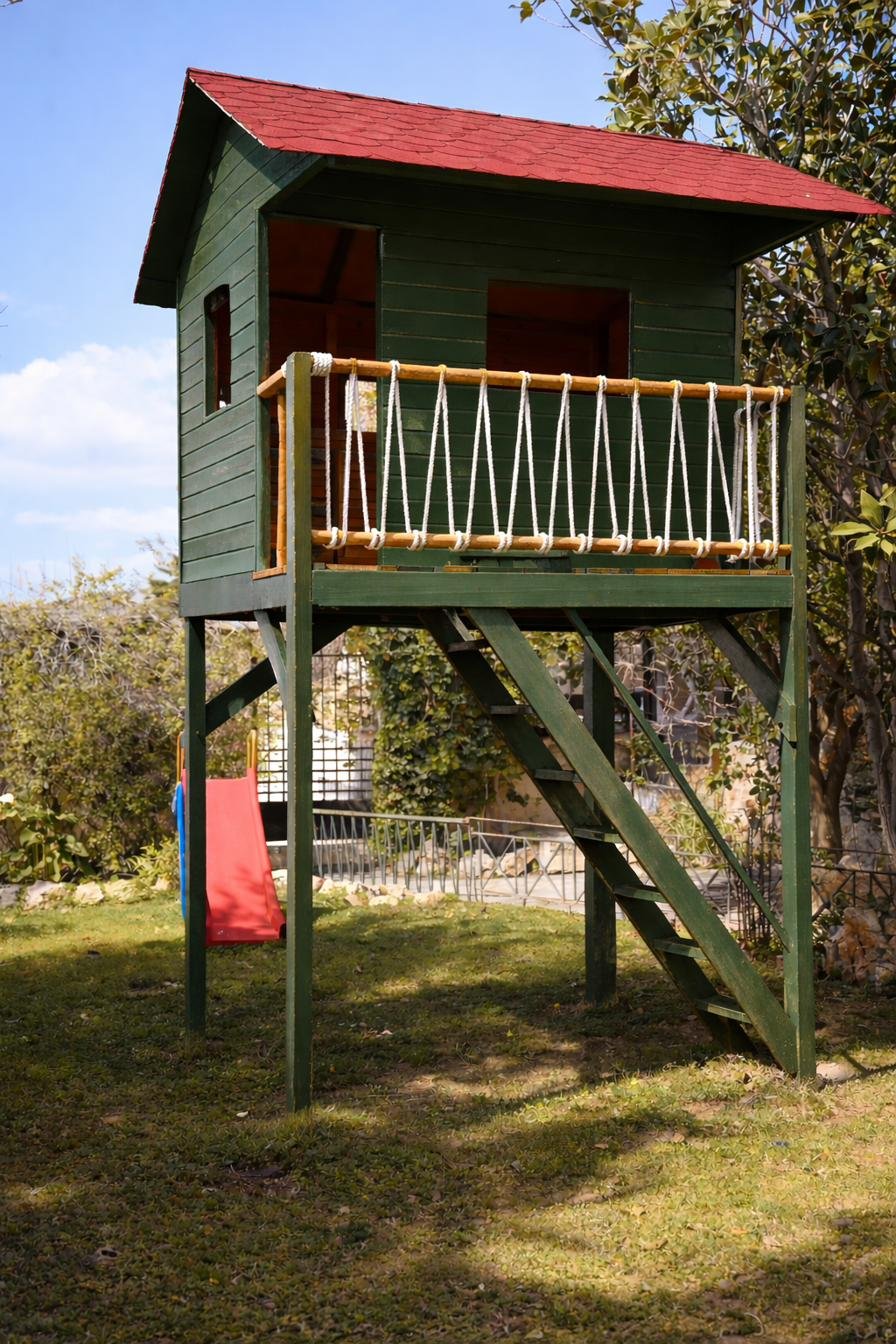 Wooden treehouse in the garden